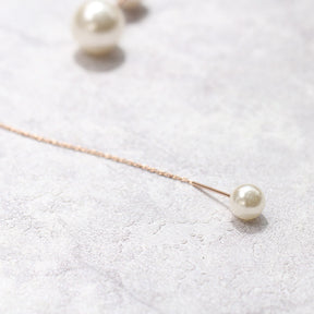 Collier ras du cou asymétrique en perles 